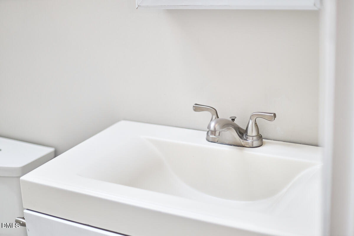 2128 Strebor Street Durham, NC 27705 - Photo 34 of 51 a close up of a bathtub