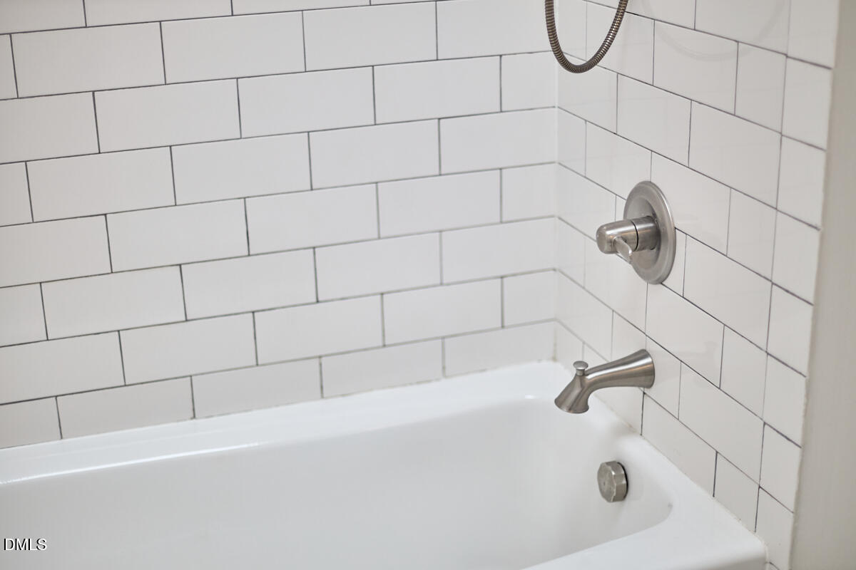 2128 Strebor Street Durham, NC 27705 - Photo 36 of 51 a bathroom with a shower