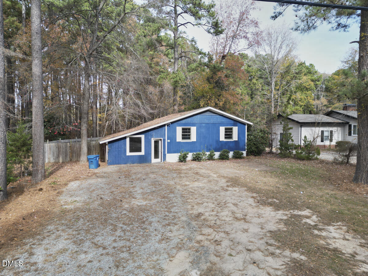 2128 Strebor Street Durham, NC 27705 - Photo 40 of 51 a house with trees in the background