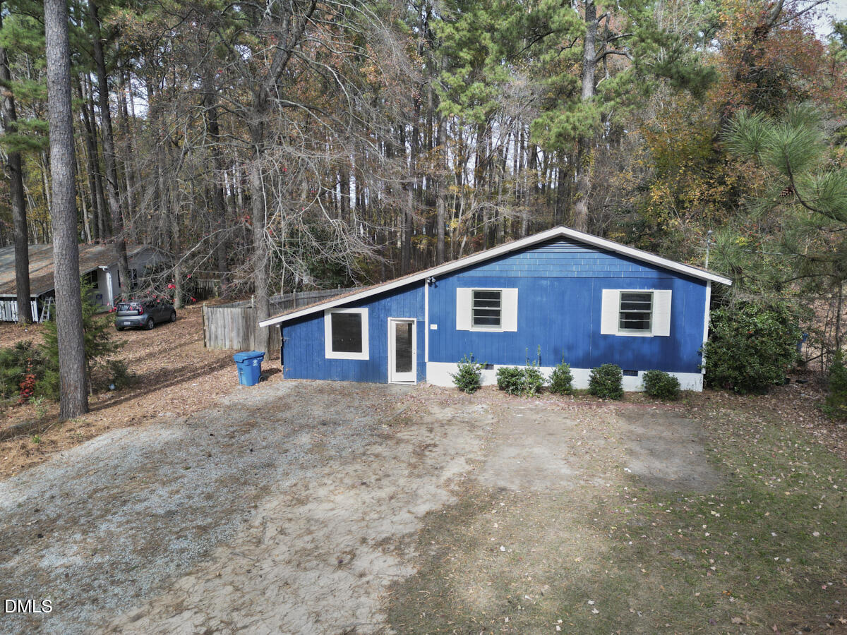 2128 Strebor Street Durham, NC 27705 - Photo 42 of 51 a view of a house with a yard and large tree