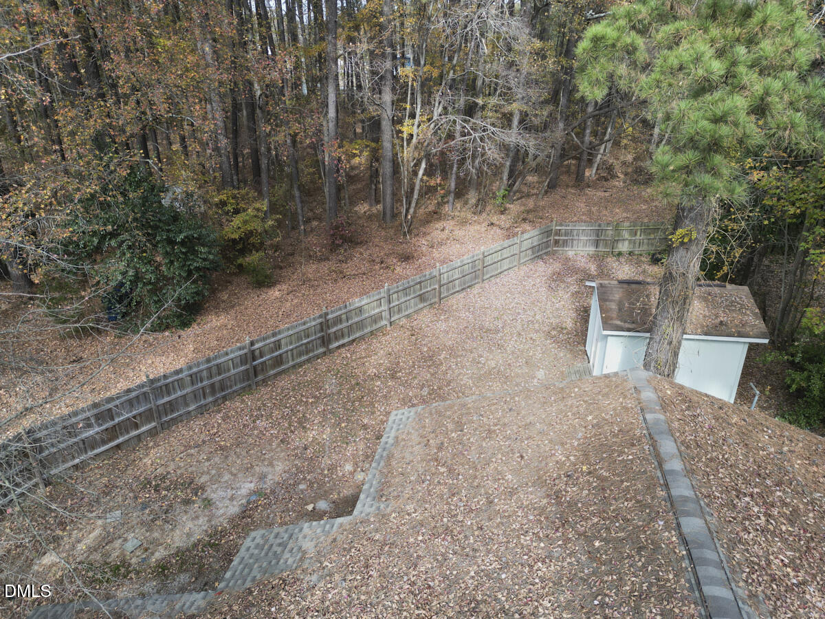 2128 Strebor Street Durham, NC 27705 - Photo 43 of 51 a road view with large trees