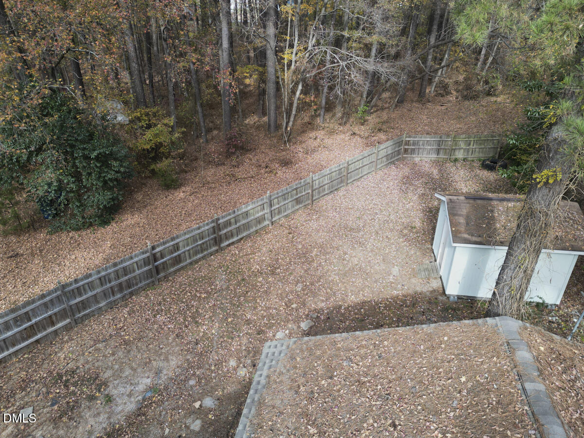 2128 Strebor Street Durham, NC 27705 - Photo 44 of 51 a view of a yard with large trees
