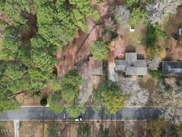 an aerial view of residential house with outdoor space