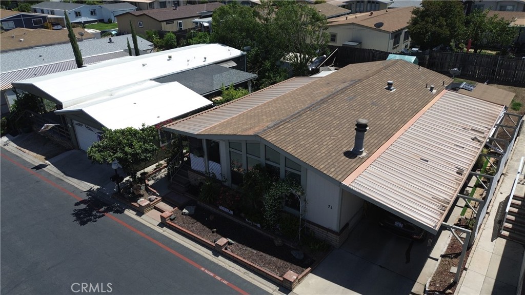 1550 Rimpau, Unit 71 Corona, CA 92881 - Photo 11 of 51 an aerial view of residential house with outdoor space and parking