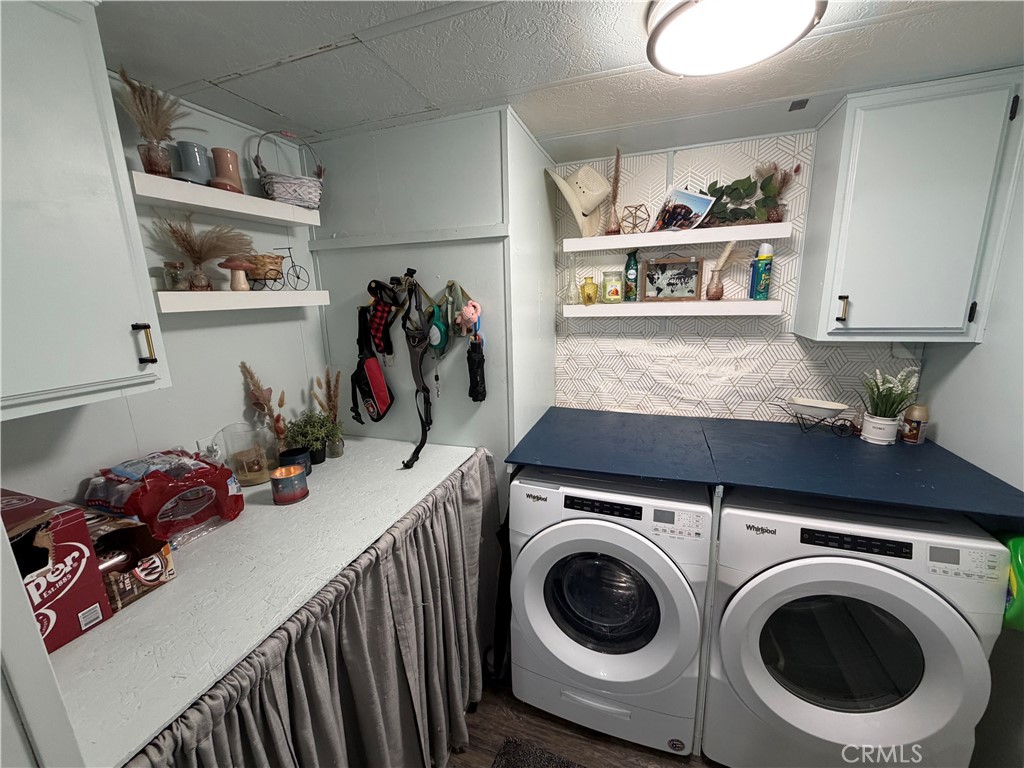 1550 Rimpau, Unit 71 Corona, CA 92881 - Photo 12 of 51 a view of a kitchen with fridge and rack