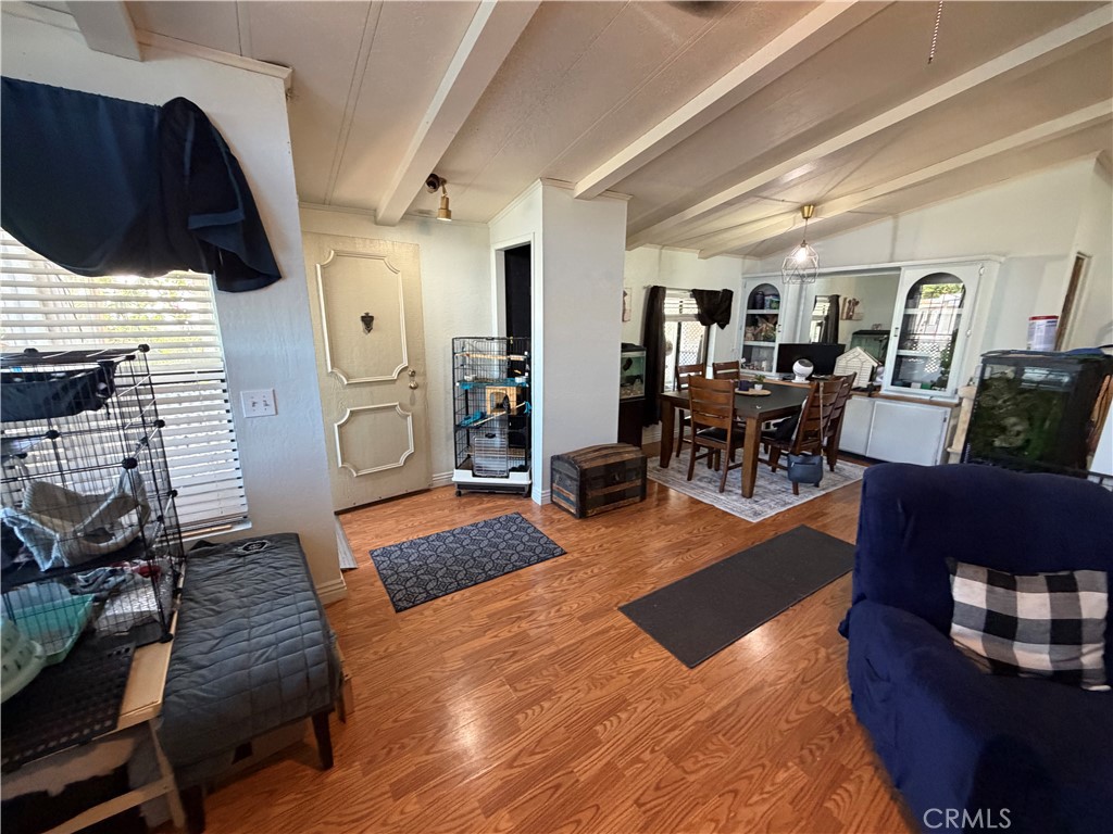 1550 Rimpau, Unit 71 Corona, CA 92881 - Photo 23 of 51 a living room with furniture and a fireplace