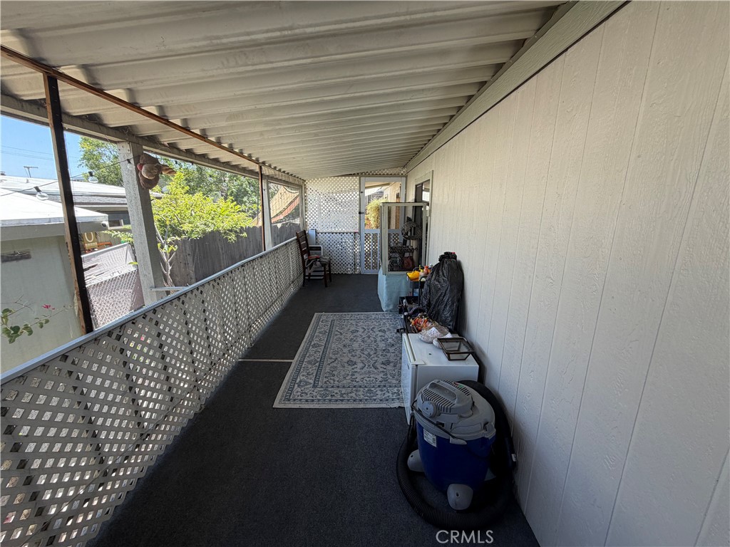 1550 Rimpau, Unit 71 Corona, CA 92881 - Photo 24 of 51 a room with furniture and a window