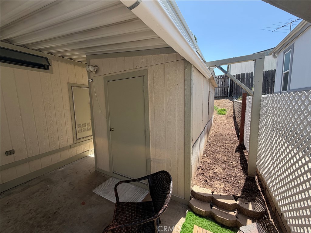1550 Rimpau, Unit 71 Corona, CA 92881 - Photo 35 of 51 a view of entryway and hall with wooden floor