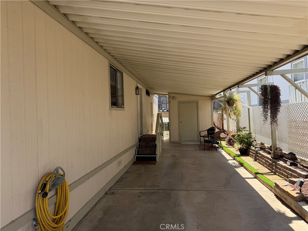 1550 Rimpau, Unit 71 Corona, CA 92881 - Photo 37 of 51 a view of a room with gym equipment