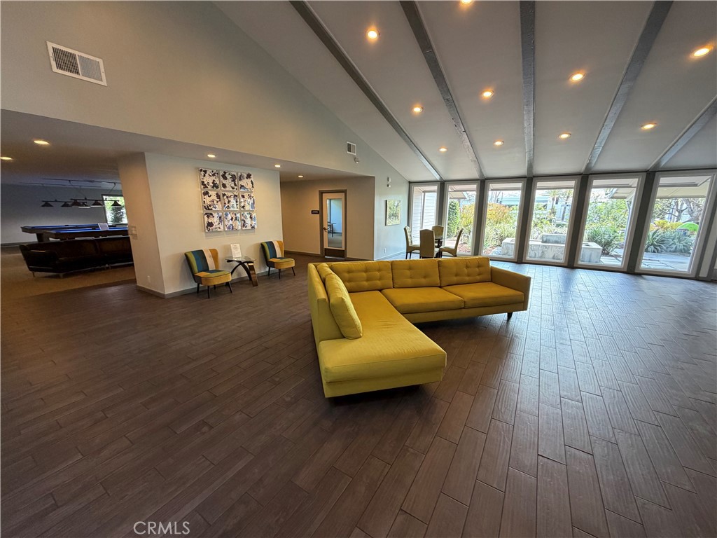 1550 Rimpau, Unit 71 Corona, CA 92881 - Photo 42 of 51 a living room with furniture and wooden floor