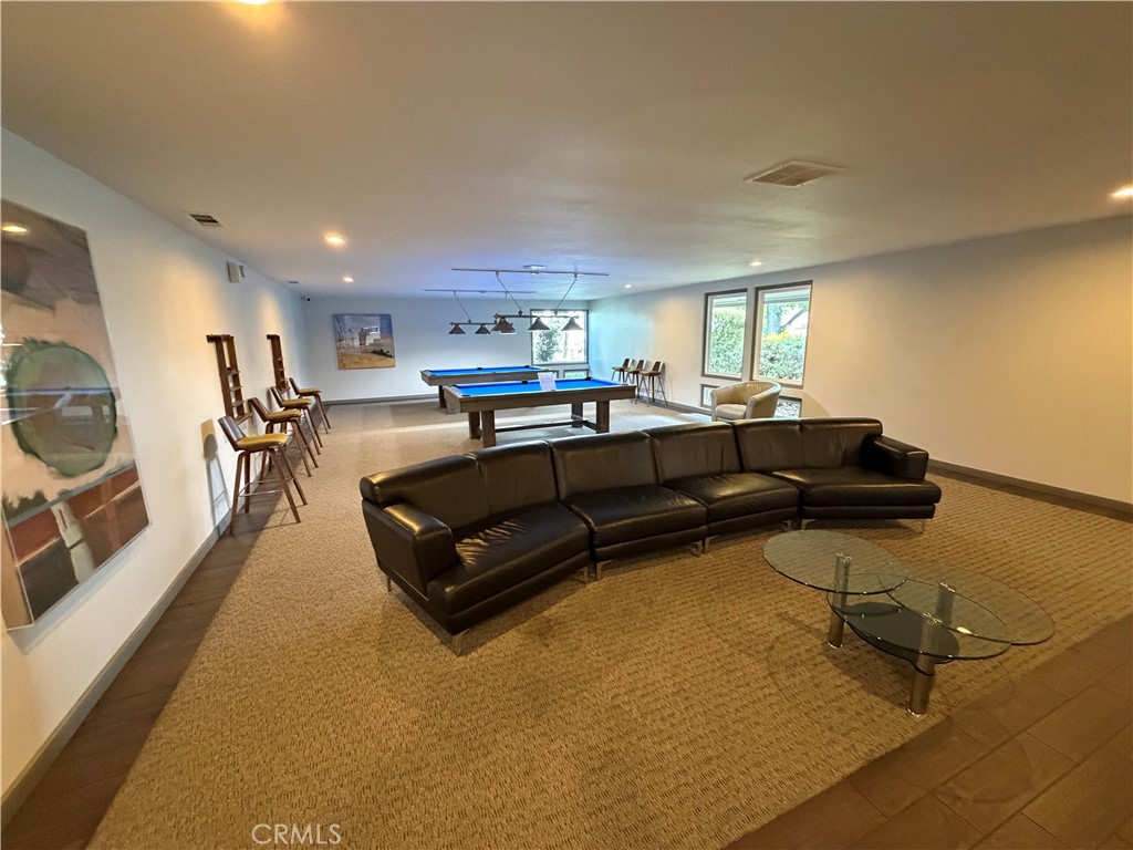 1550 Rimpau, Unit 71 Corona, CA 92881 - Photo 43 of 51 a living room with furniture and a table