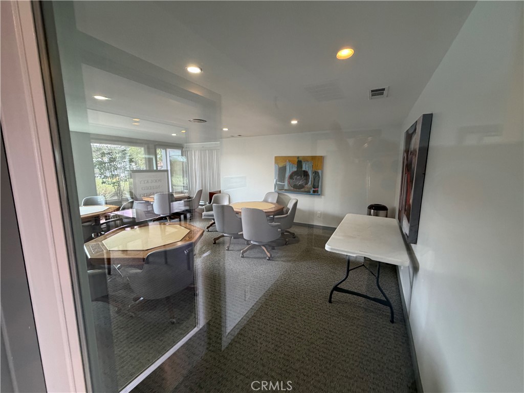 1550 Rimpau, Unit 71 Corona, CA 92881 - Photo 47 of 51 a view of a living room and dining room