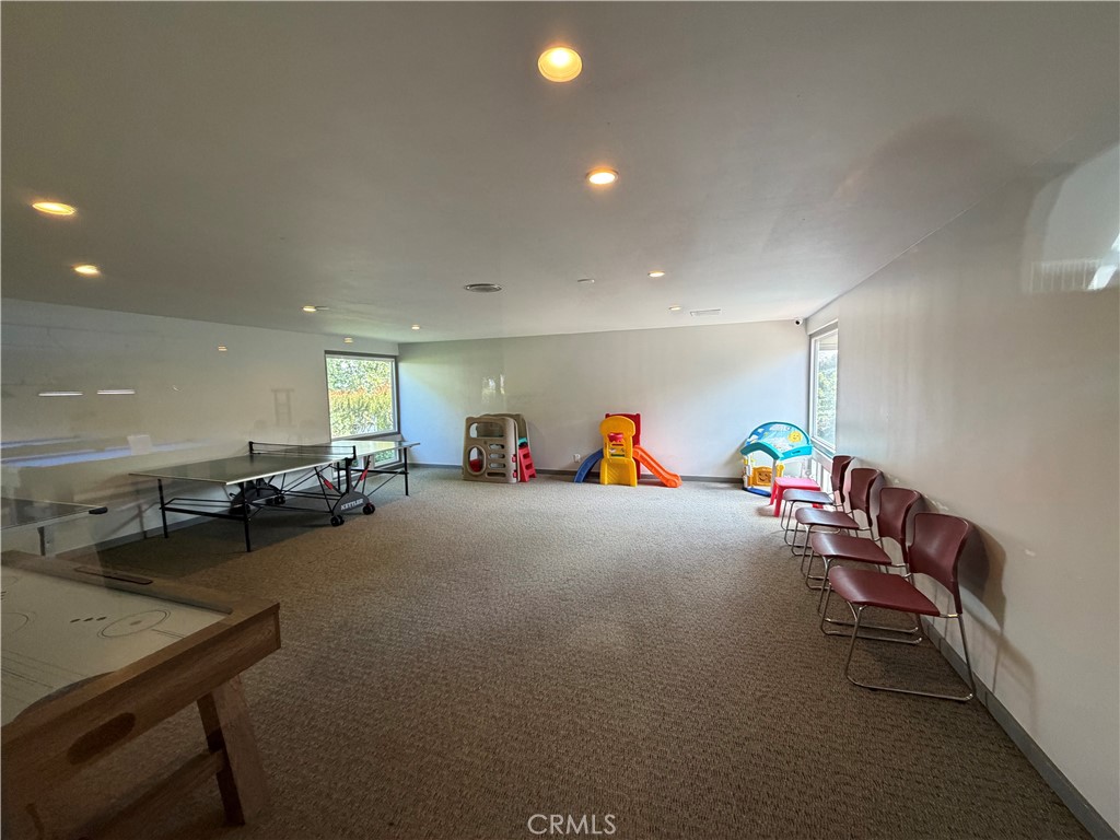 1550 Rimpau, Unit 71 Corona, CA 92881 - Photo 48 of 51 a view of a room with gym equipment