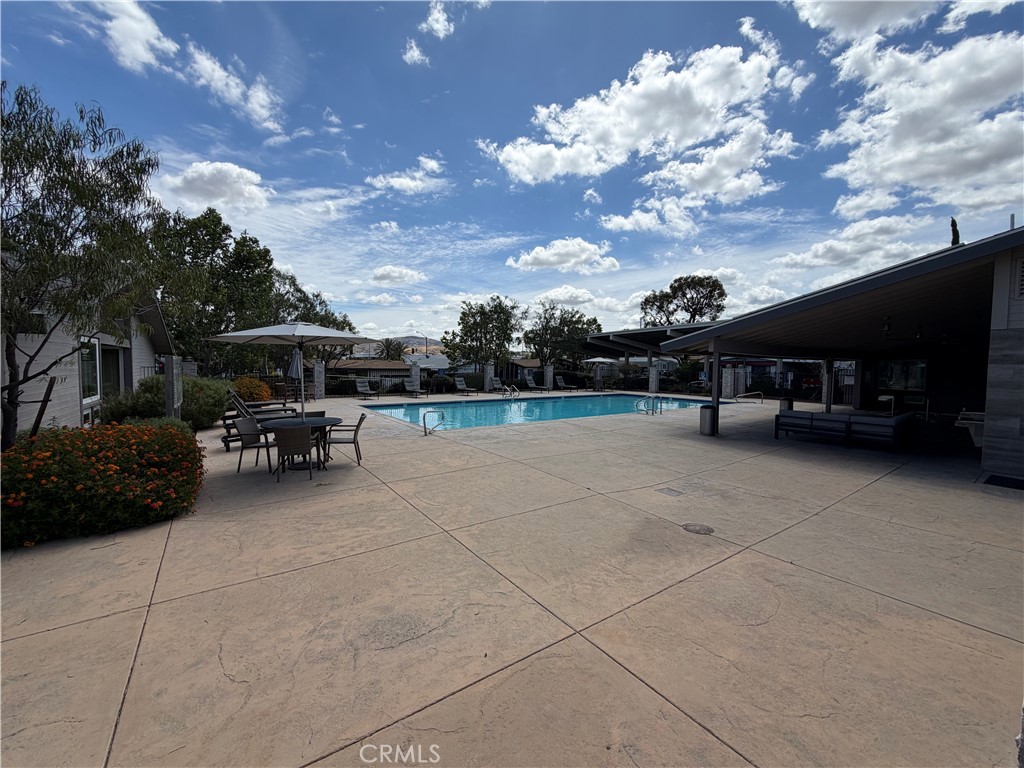 1550 Rimpau, Unit 71 Corona, CA 92881 - Photo 51 of 51 a view of outdoor space with seating