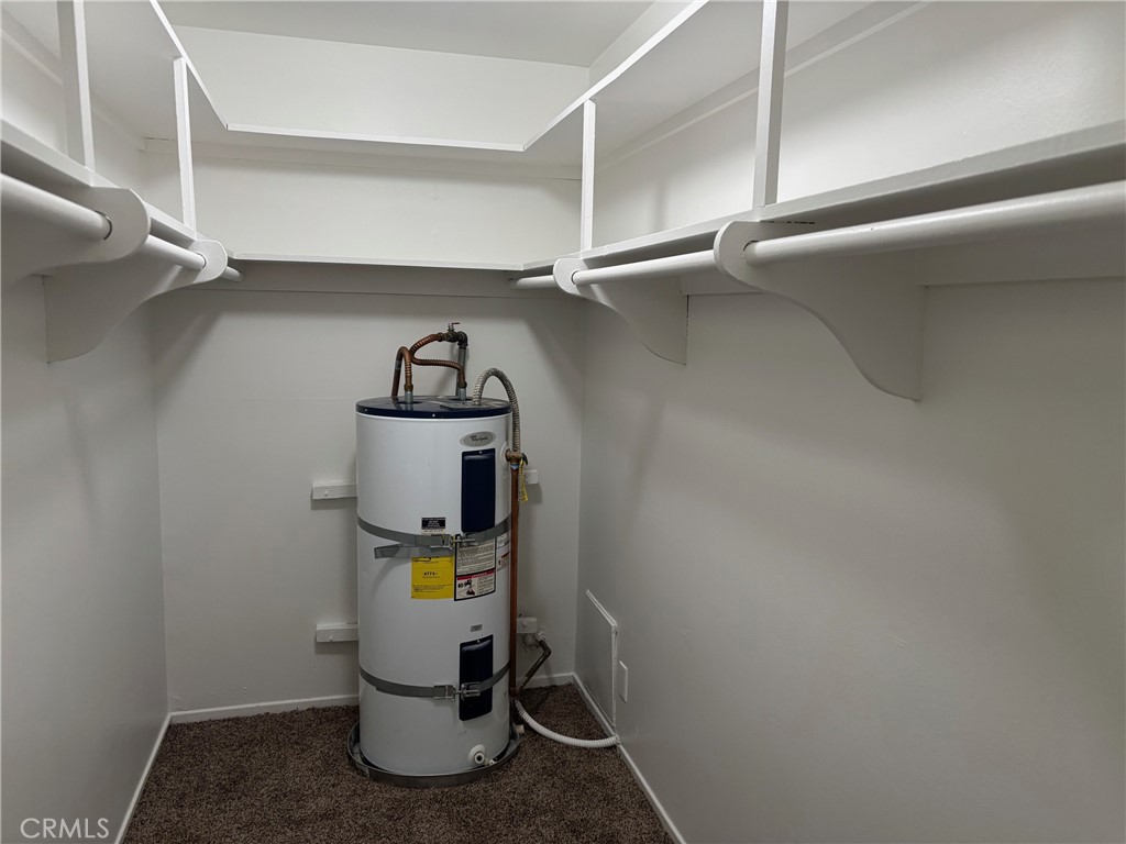 14718 Magnolia Boulevard, Unit 5 Sherman Oaks, CA 91403 - Photo 4 of 7 a view of storage and utility room with racks on the wall