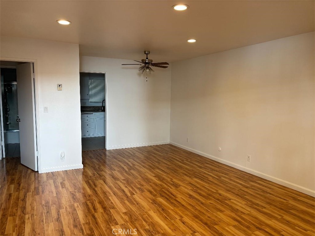 14718 Magnolia Boulevard, Unit 5 Sherman Oaks, CA 91403 - Photo 6 of 7 a view of empty room with wooden floor