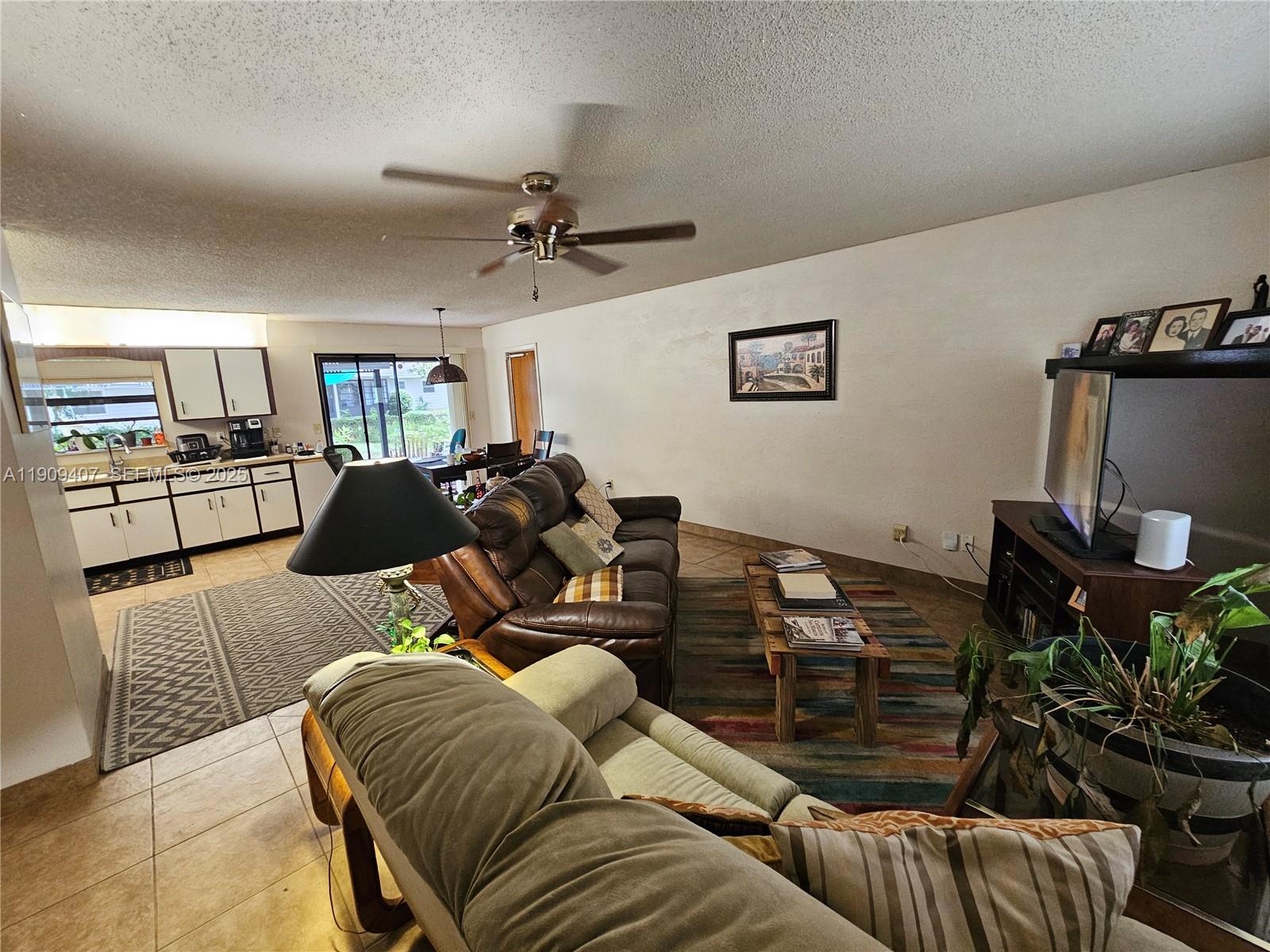 5108 Myrtle Drive Fort Pierce, FL 34982 - Photo 2 of 30 a living room with furniture and a couch