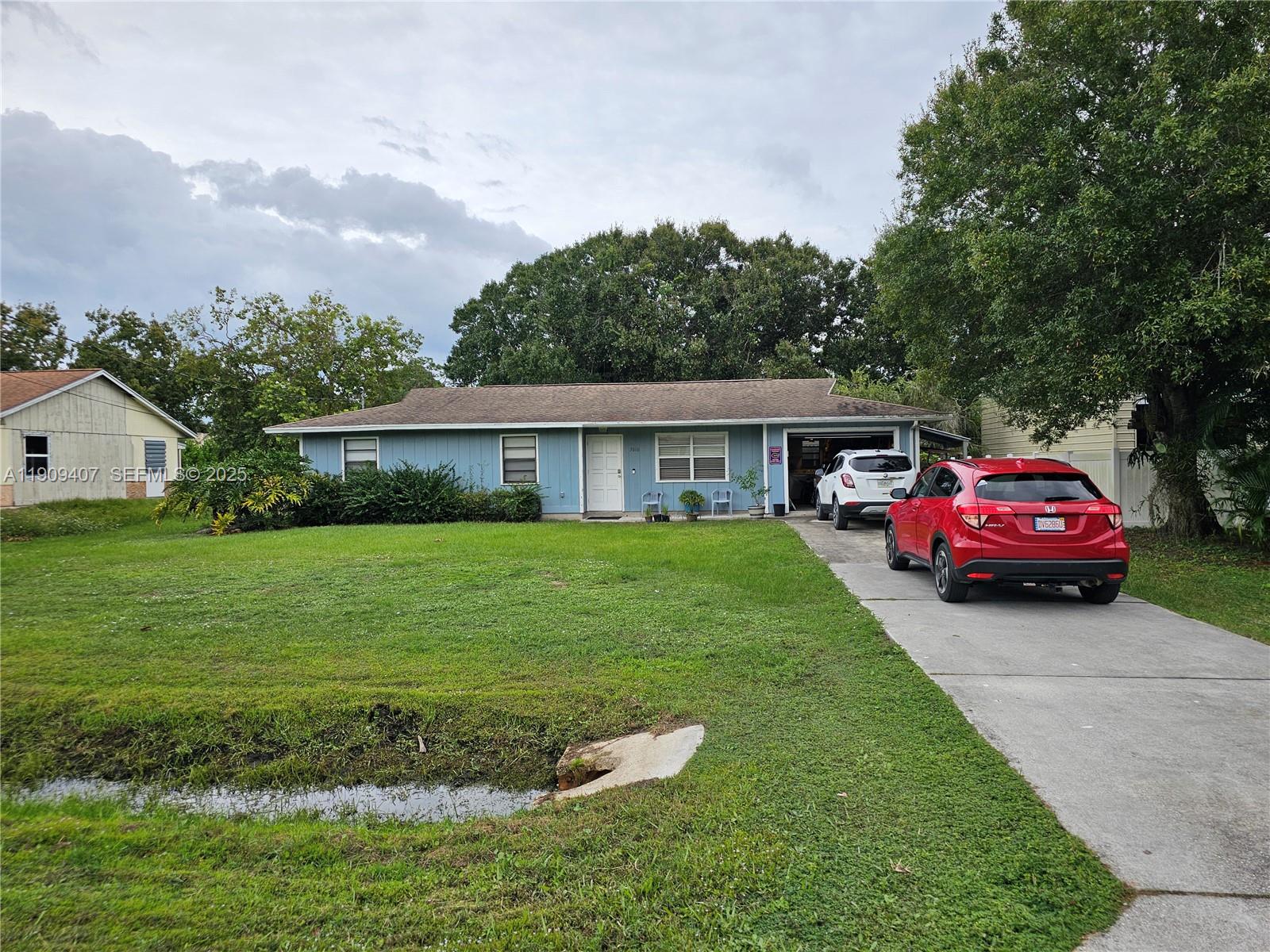 5108 Myrtle Drive Fort Pierce, FL 34982 - Photo 24 of 30 a house view with a garden space
