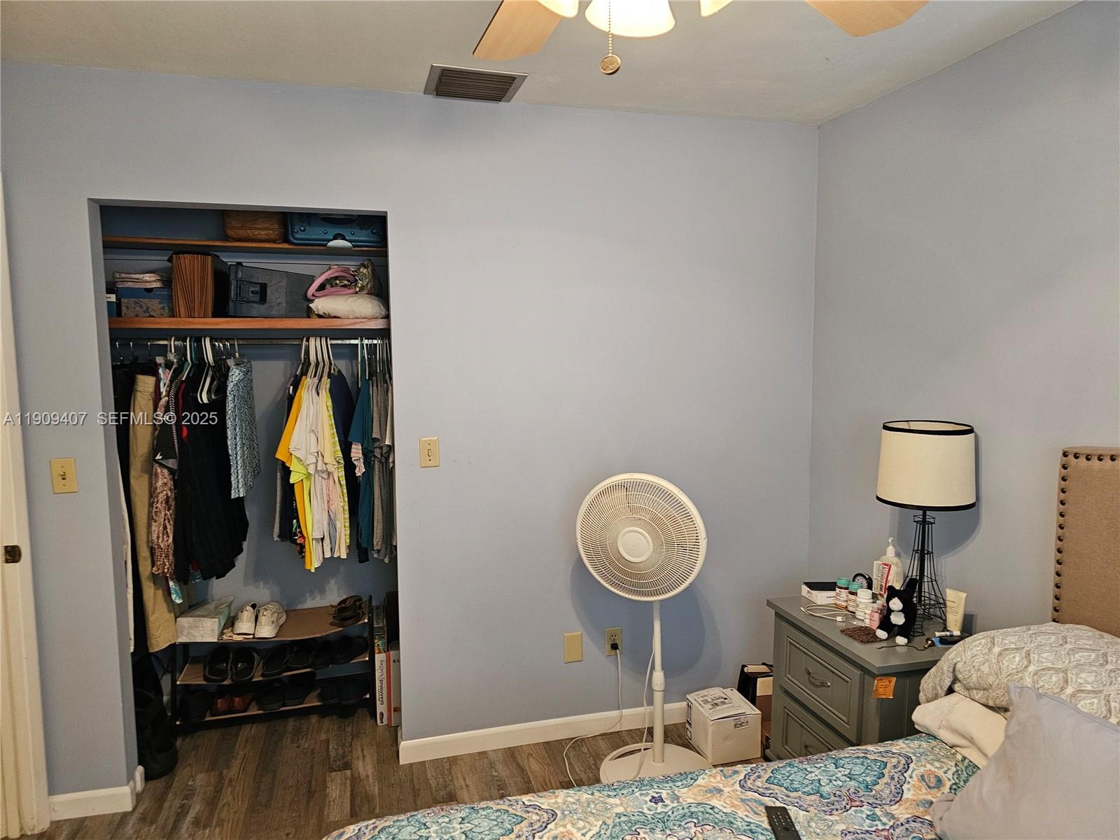 5108 Myrtle Drive Fort Pierce, FL 34982 - Photo 26 of 30 a bedroom with bed and a closet