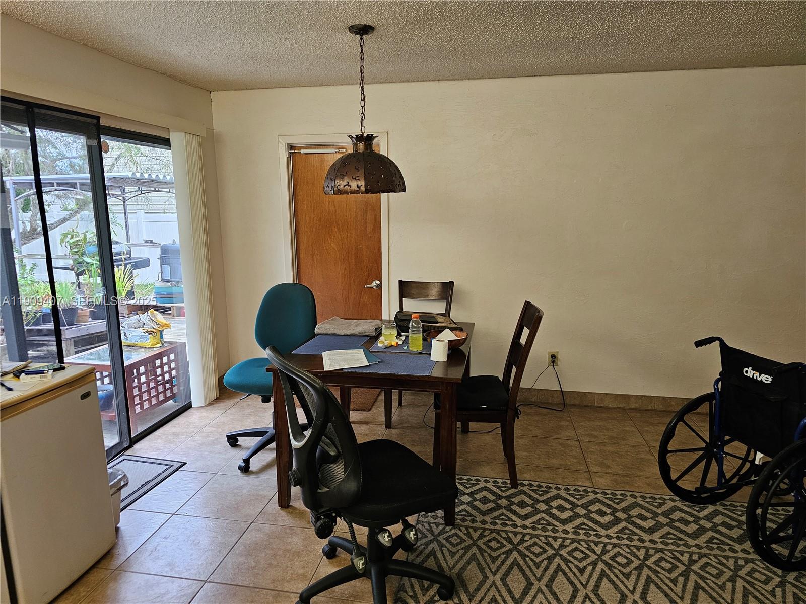 5108 Myrtle Drive Fort Pierce, FL 34982 - Photo 4 of 30 a workspace with furniture and a window