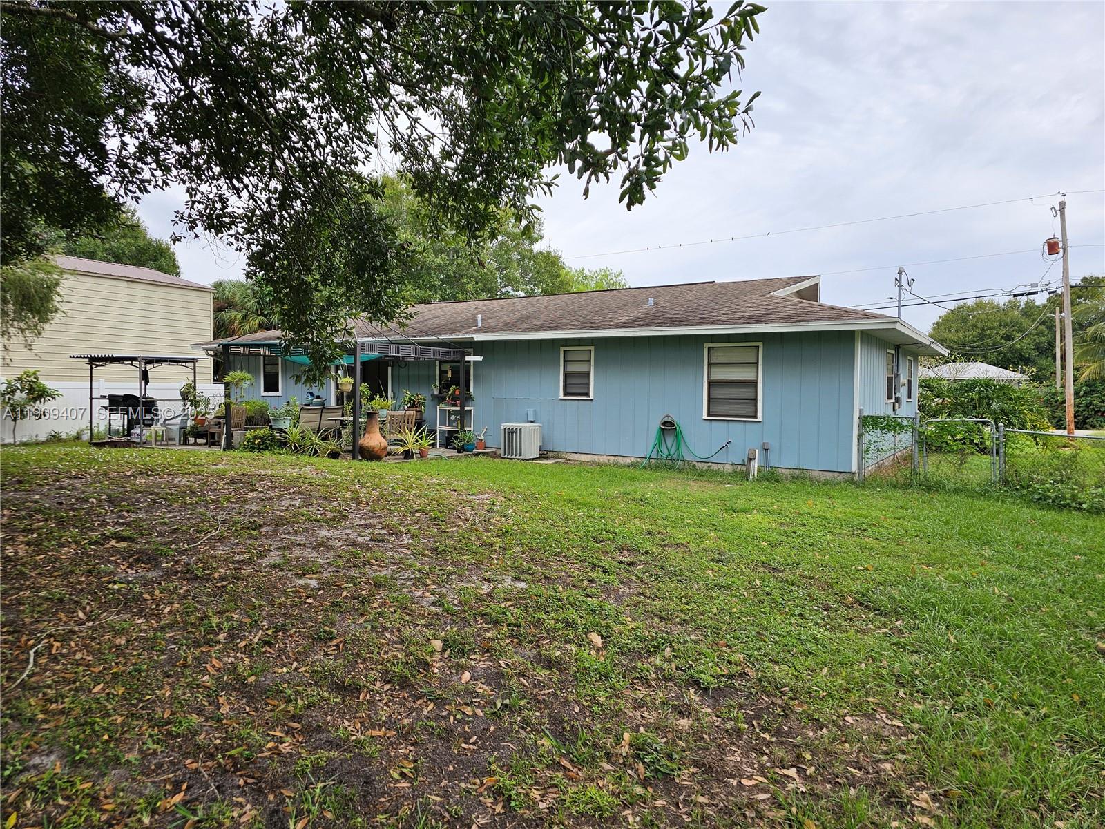 5108 Myrtle Drive Fort Pierce, FL 34982 - Photo 7 of 30 a front view of house with yard