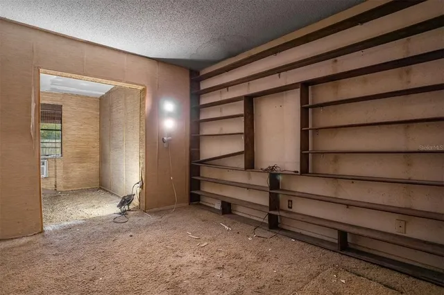 a sign that is on a brick wall