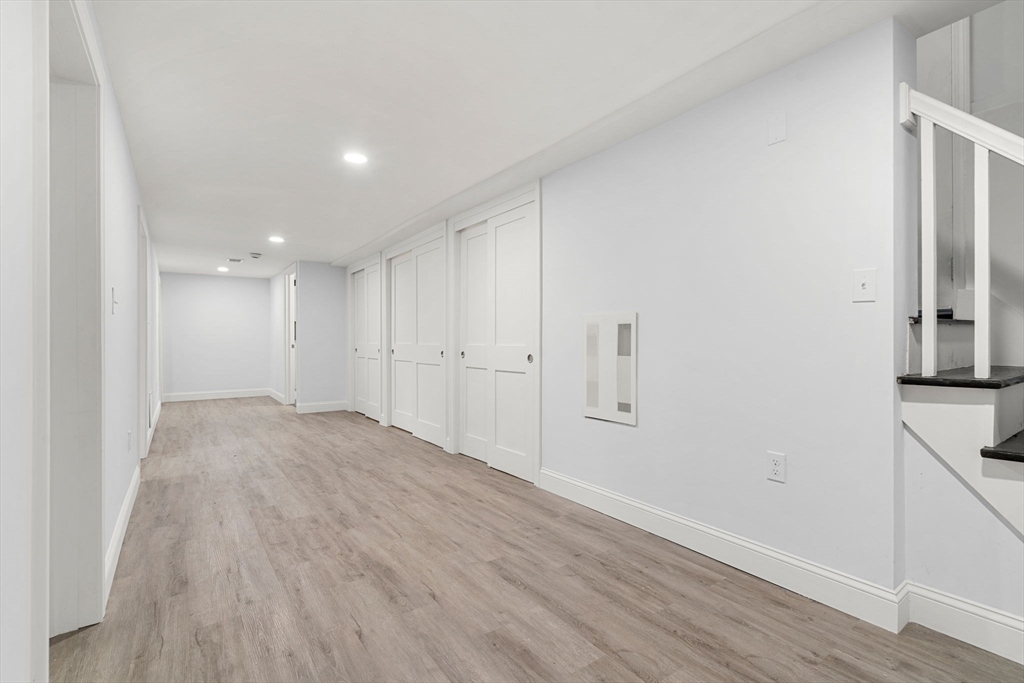 50 Bow Street Saugus, MA 01906 - Photo 21 of 37 a view of a room with wooden floor and a sink
