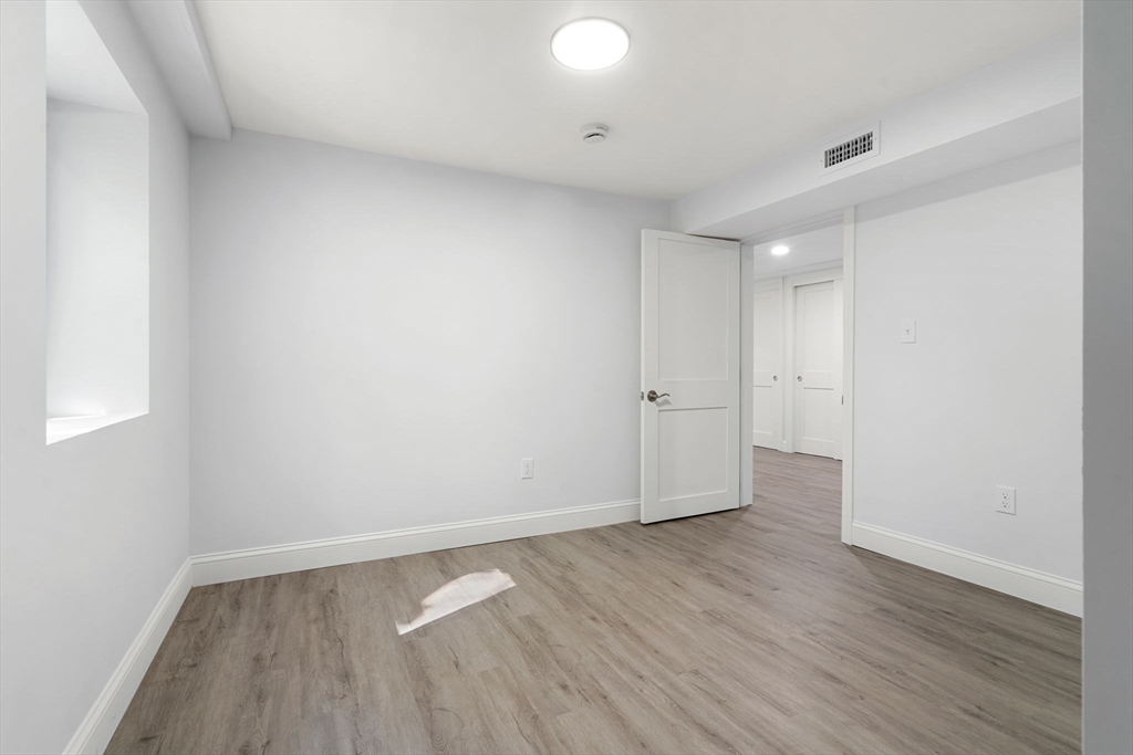50 Bow Street Saugus, MA 01906 - Photo 31 of 37 wooden floor in an empty room