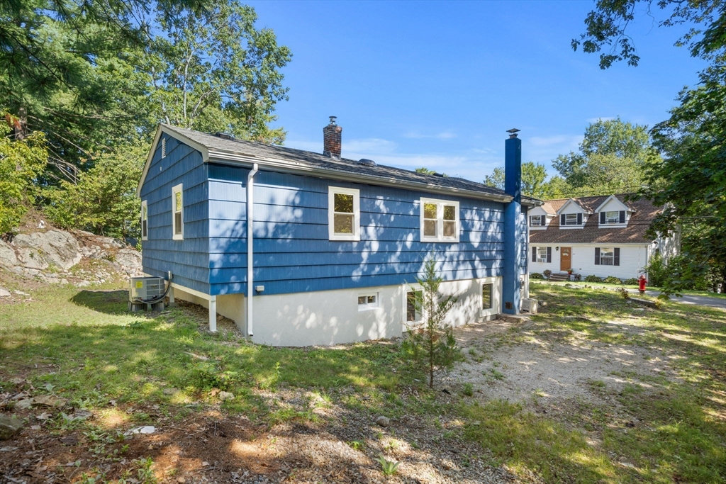 50 Bow Street Saugus, MA 01906 - Photo 33 of 37 a view of a house with a yard