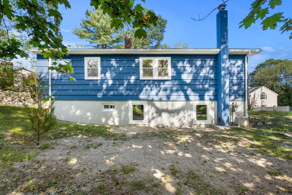 50 Bow Street Saugus, MA 01906 - Photo 34 of 37 a front view of a house with a yard