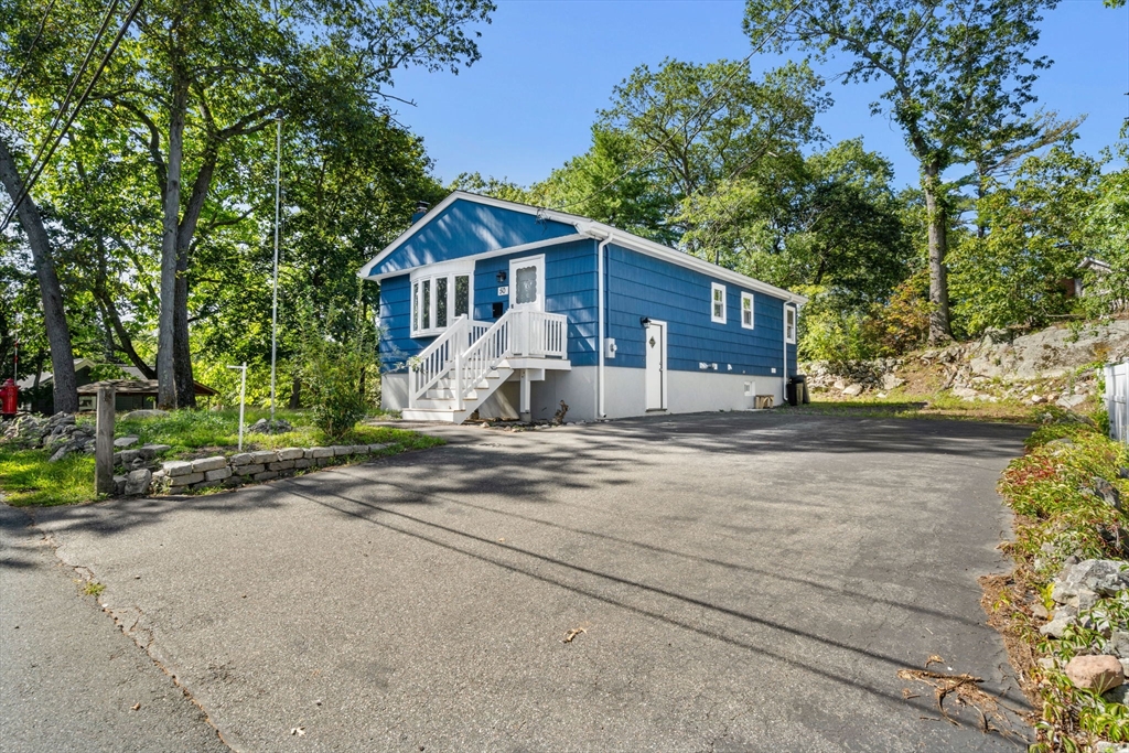 50 Bow Street Saugus, MA 01906 - Photo 37 of 37 a view of a house with a yard