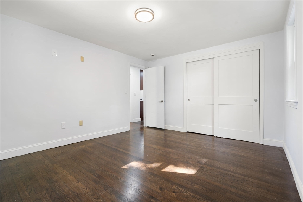 50 Bow Street Saugus, MA 01906 - Photo 4 of 37 an empty room with wooden floor