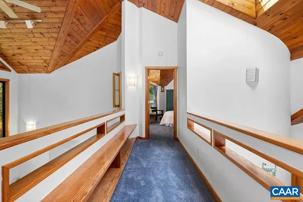 a view of balcony with wooden floor