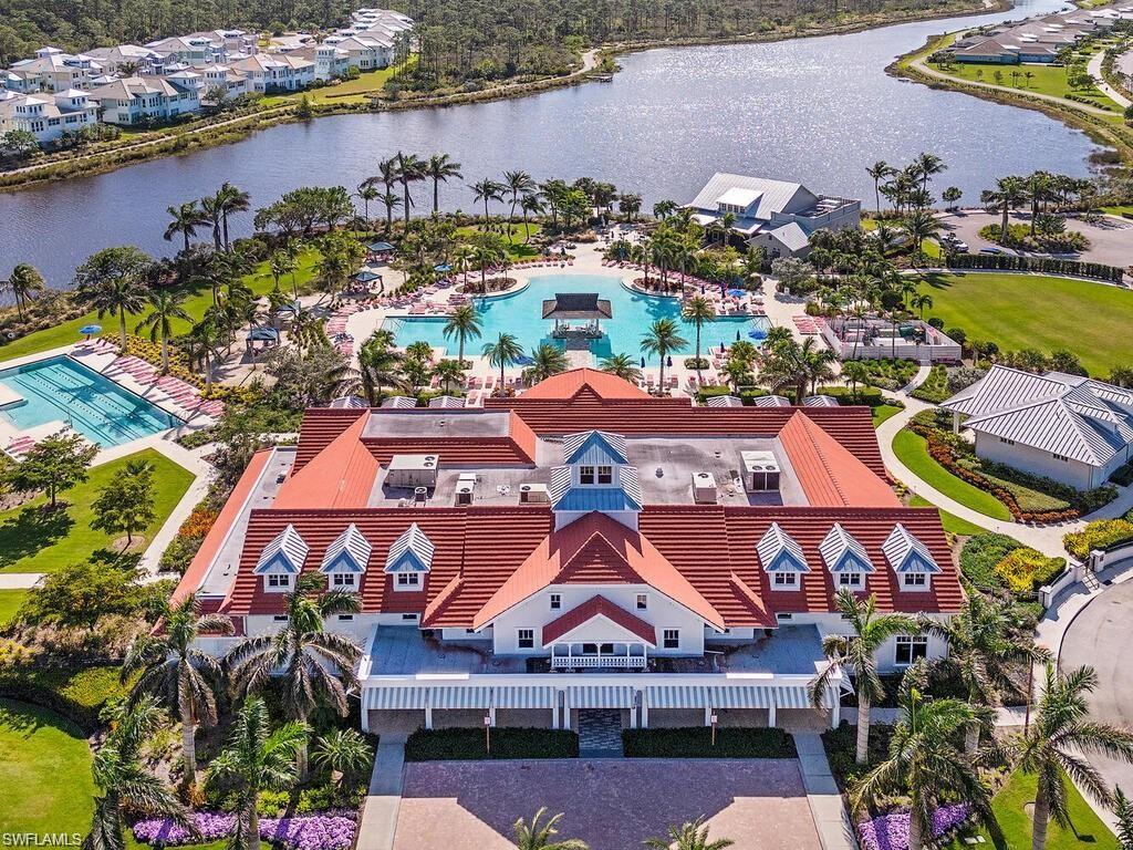 6809 Bequia Way Naples, FL 34113 - Photo 48 of 49 Aerial view of a large body of water and a pool