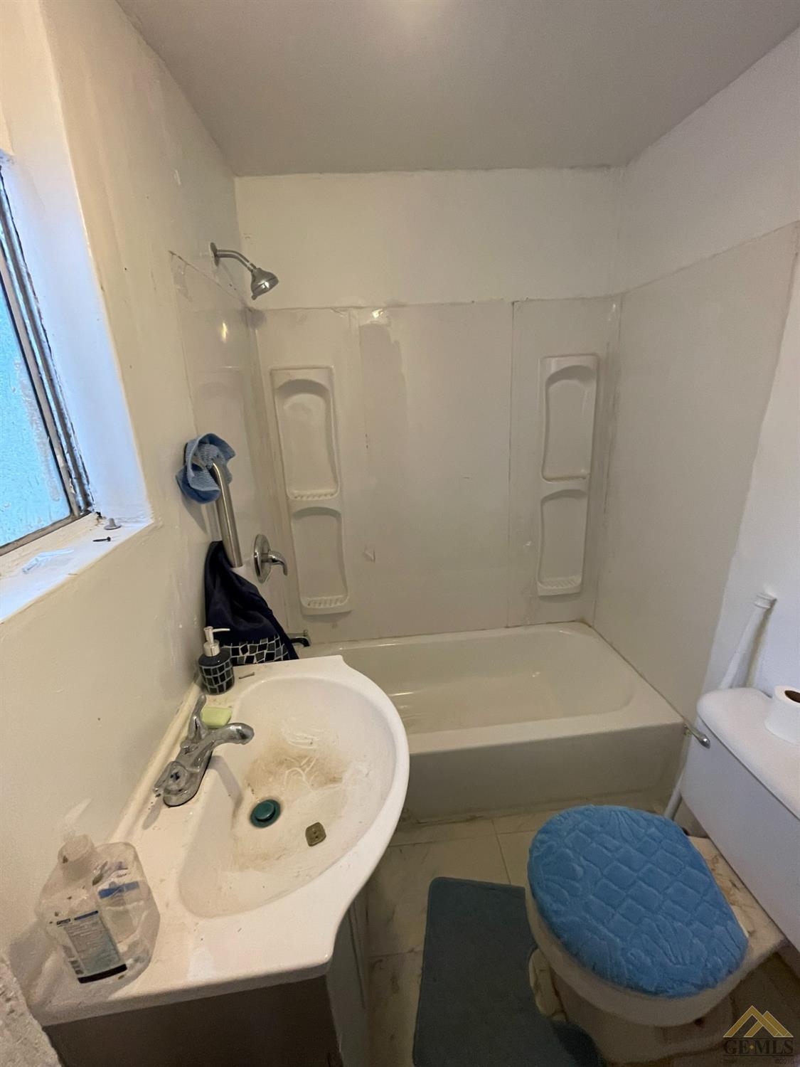 Undisclosed Address Bakersfield, CA 93308 - Photo 5 of 13 a bathroom with a sink toilet and shower