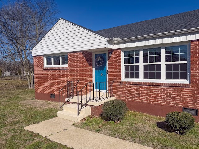 804 Morgan Street Pulaski, TN 38478 - Photo 3 of 30 a front view of a house with a yard