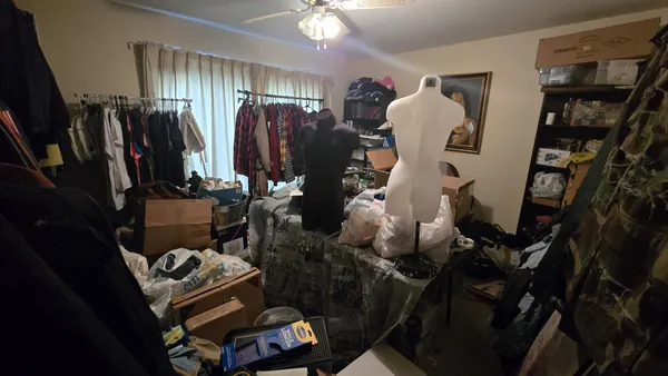 a room with lots of stuff and hardwood floor