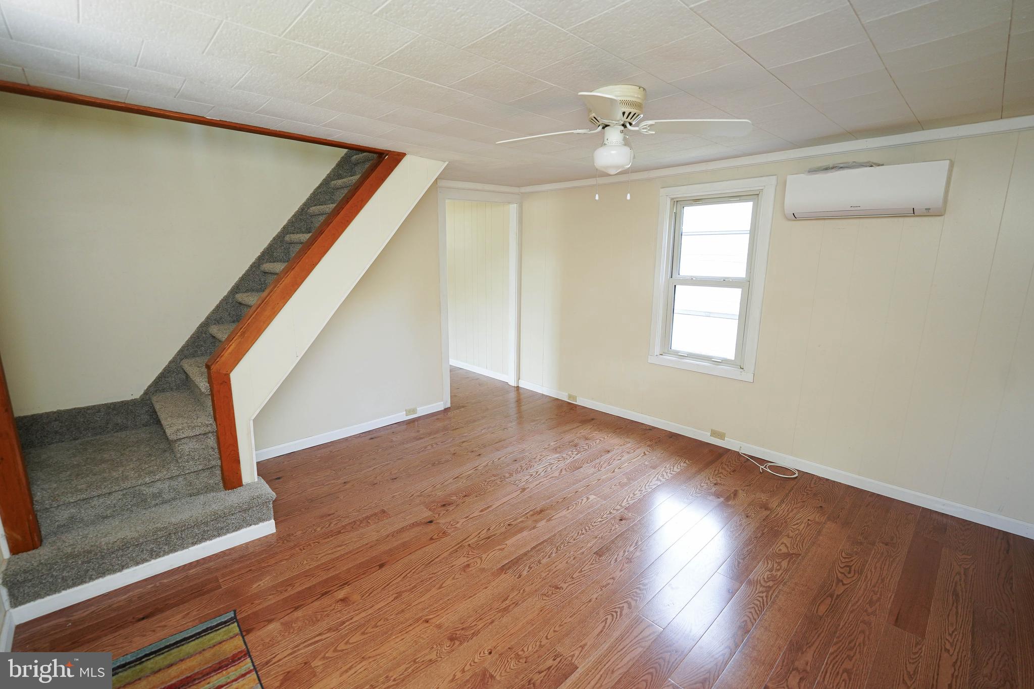533 East 4th Street Laurel, DE 19956 - Photo 12 of 42 a view of entryway and hall with wooden floor