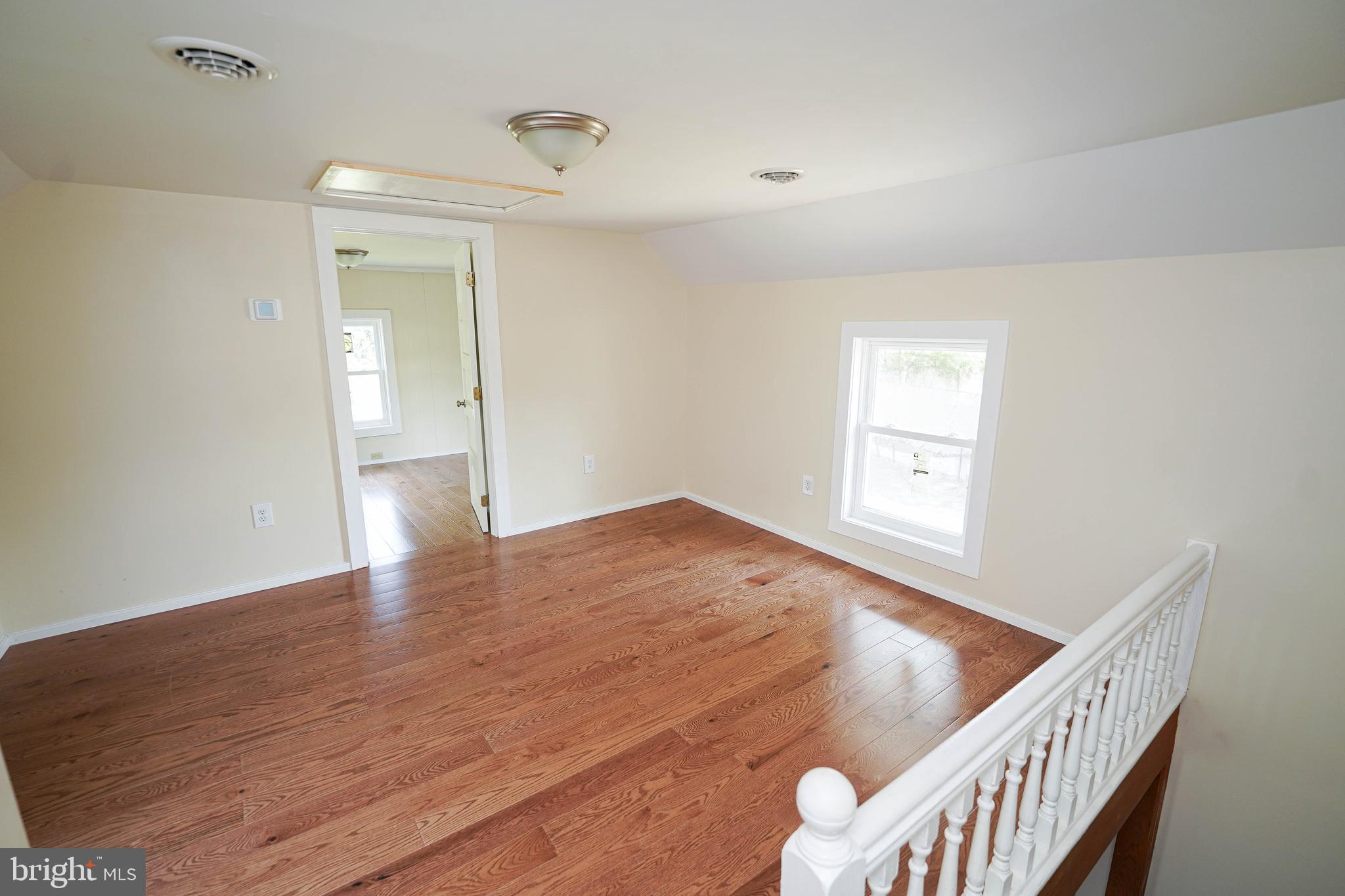 533 East 4th Street Laurel, DE 19956 - Photo 23 of 42 a view of an empty room and wooden floor