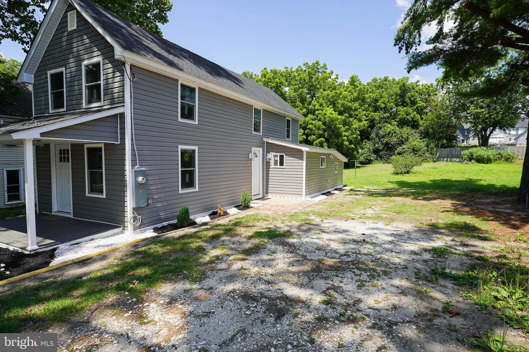 533 East 4th Street Laurel, DE 19956 - Photo 4 of 42 a view of backyard of house with green space