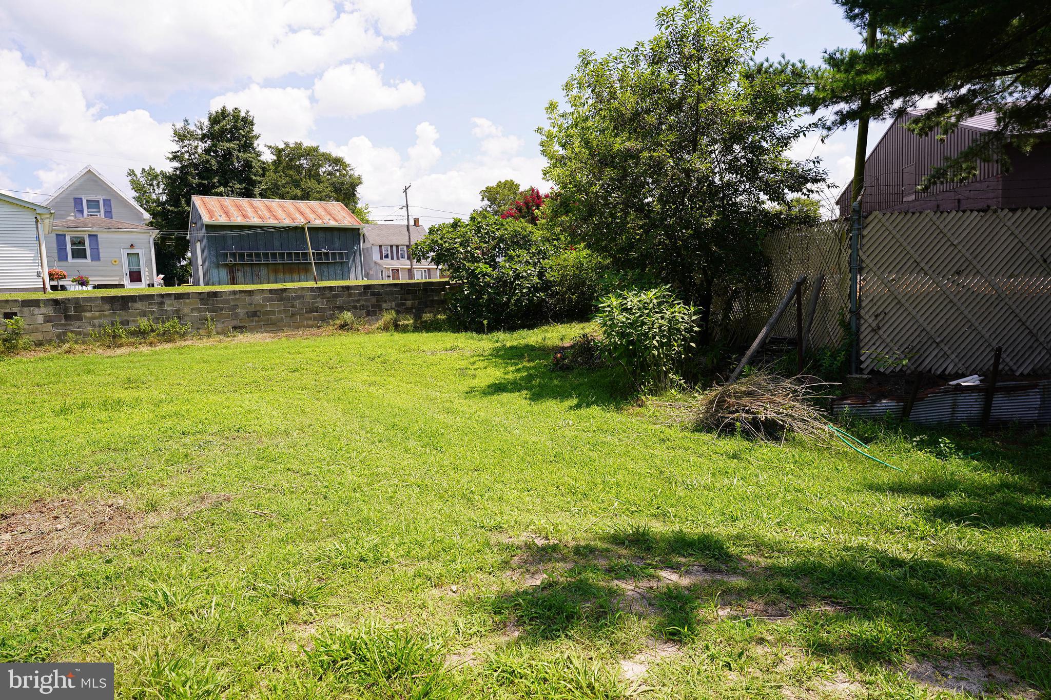 533 East 4th Street Laurel, DE 19956 - Photo 41 of 42 a front view of house with yard and green space