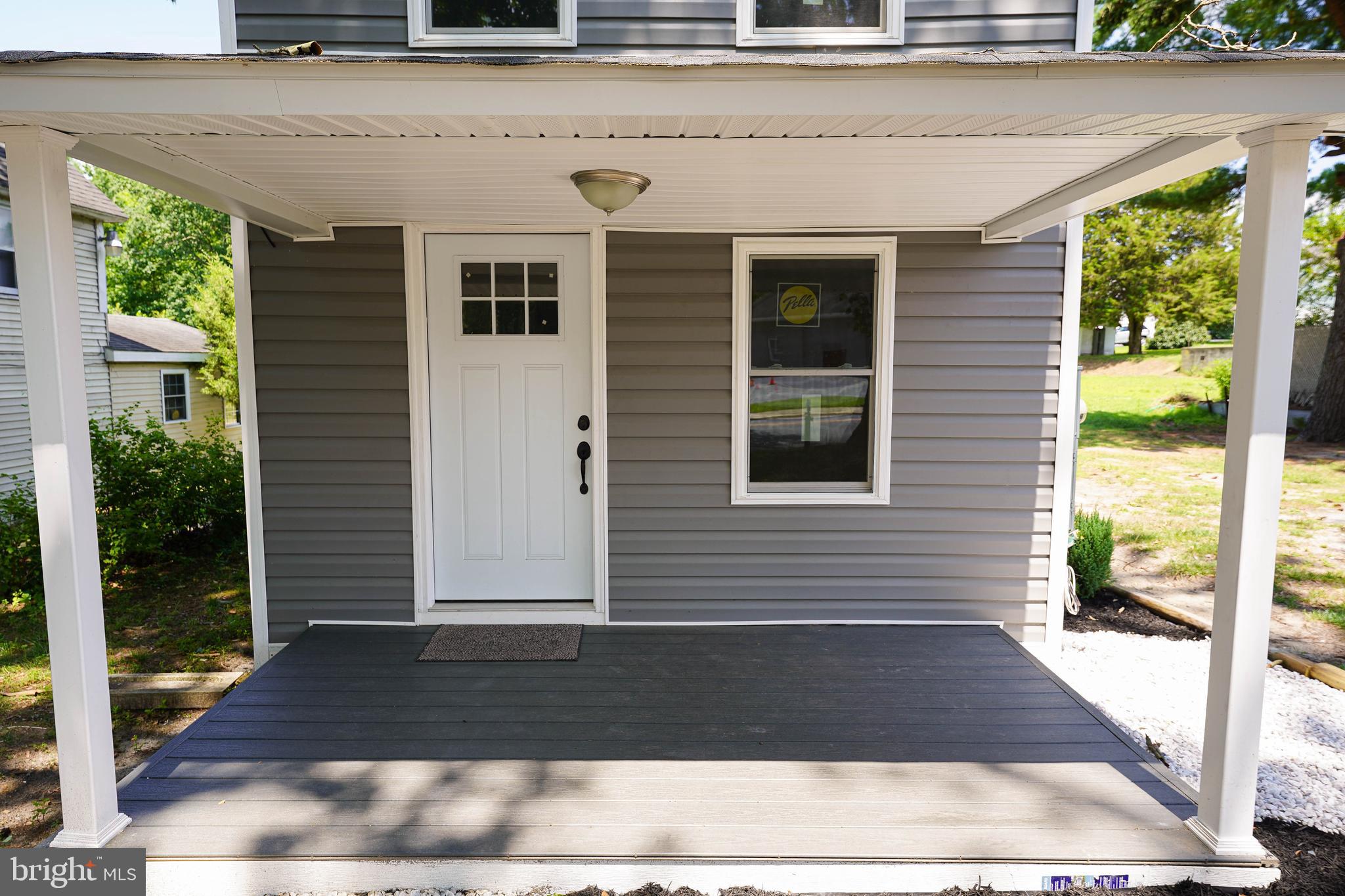 533 East 4th Street Laurel, DE 19956 - Photo 5 of 42 a black and white door of a house
