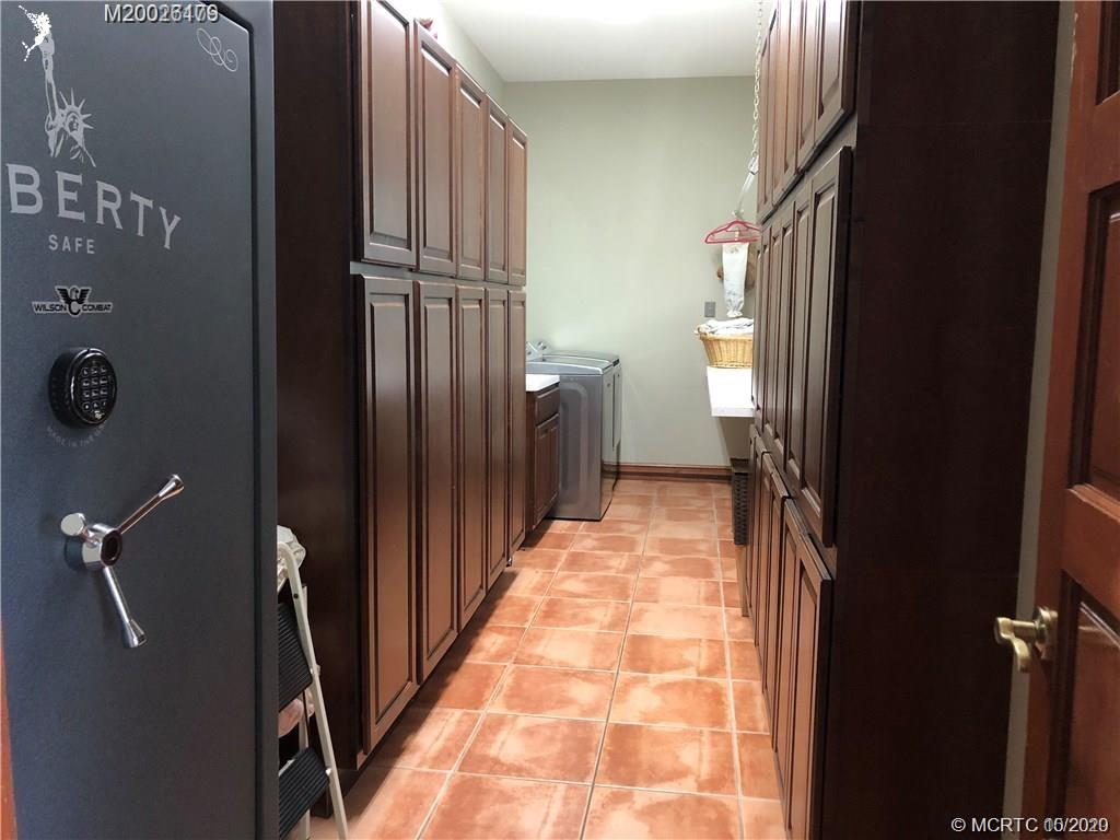 15 Middle Road Stuart, FL 34996 - Photo 20 of 28 a view of hallway with stairs
