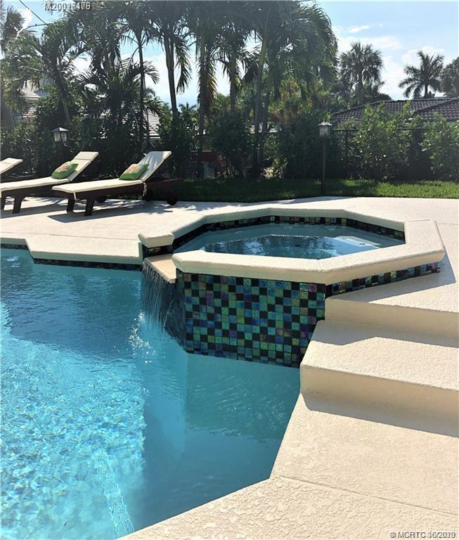 15 Middle Road Stuart, FL 34996 - Photo 23 of 28 a view of swimming pool with back yard