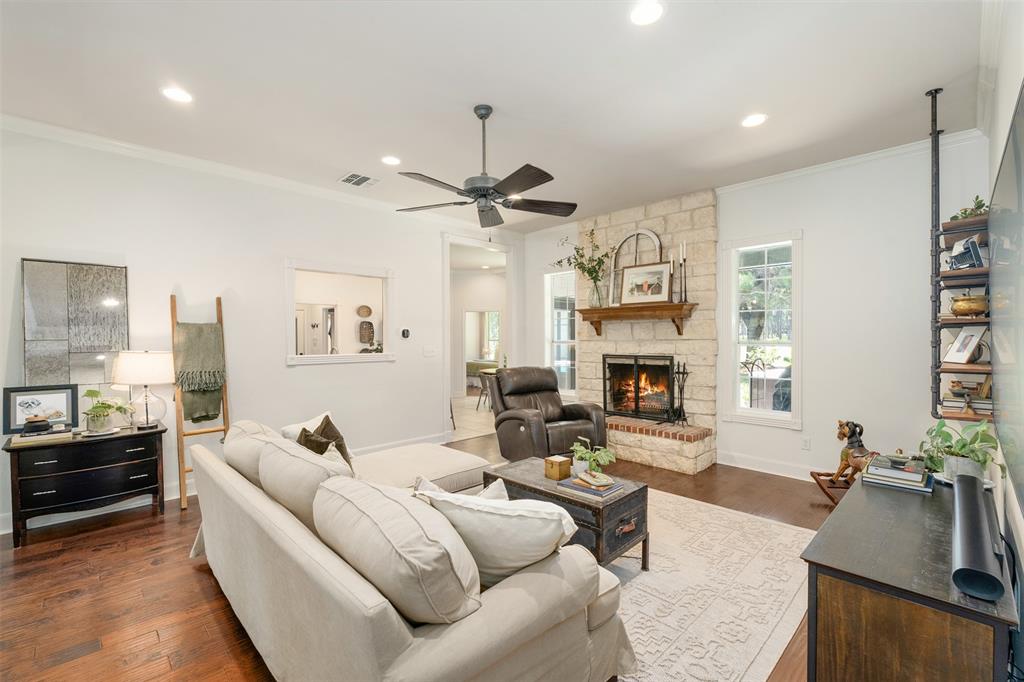 1109 Robbins Road Athens, TX 75751 - Photo 6 of 39 open living area with wood burning fireplace