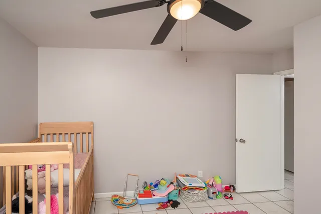 a view of a hardwood floor and staircase