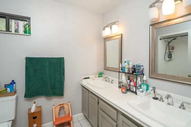 a bathroom with a bath tub and shower