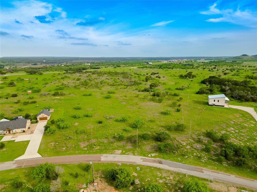 4-6 Hells Gate Loop Strawn, TX 76475 - Photo 1 of 13 a view of yard with ocean view