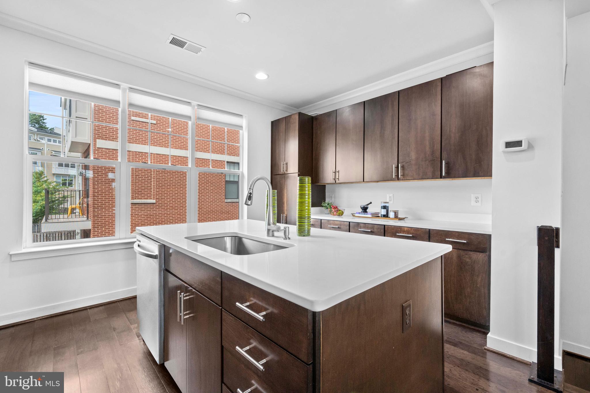 3334 7th Street Northeast Washington, DC 20017 - Photo 11 of 38 a kitchen that has a sink and a stove in it