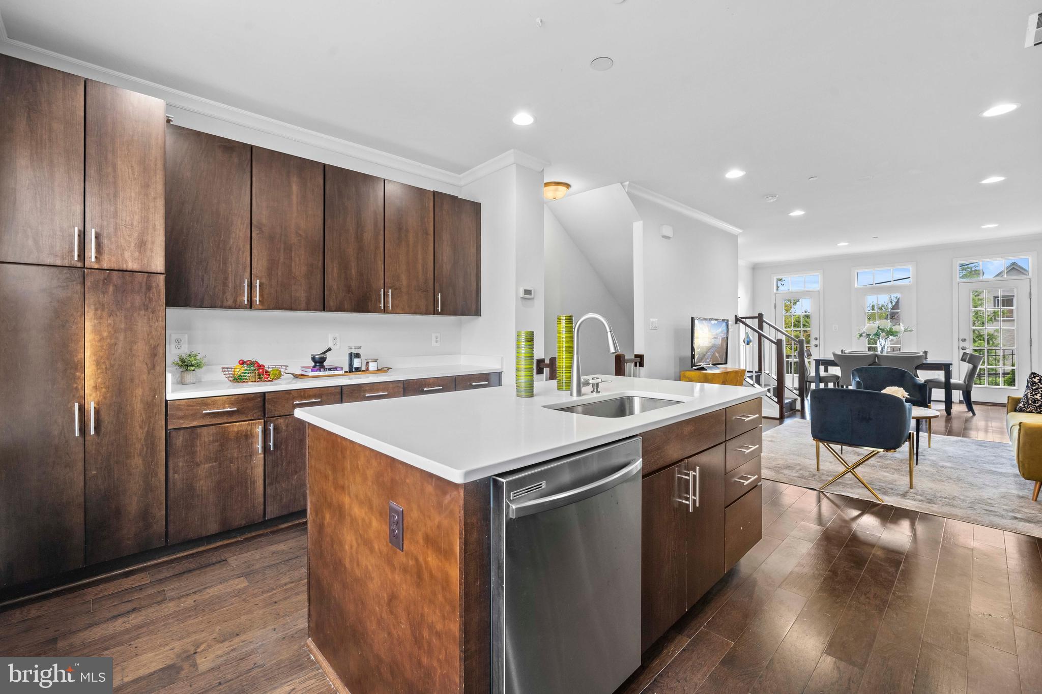 3334 7th Street Northeast Washington, DC 20017 - Photo 13 of 38 a kitchen with a sink a counter top space and stainless steel appliances